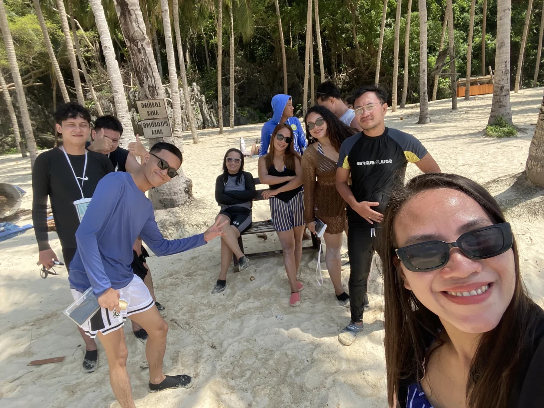 The MyThorneAI team on a palm-lined beach